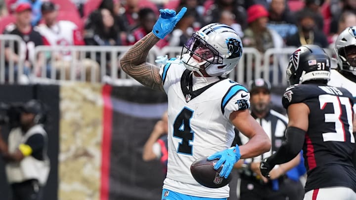 Nov 16, 2025; Atlanta, Georgia, USA; Carolina Panthers wide receiver Tetairoa McMillan (4) celebrates a touchdown in the first quarter against the Atlanta Falcons at Mercedes-Benz Stadium. Nov 16, 2025; Atlanta, Georgia, USA; Carolina Panthers wide receiver Tetairoa McMillan (4) celebrates a touchdown in the first quarter against the Atlanta Falcons at Mercedes-Benz Stadium.