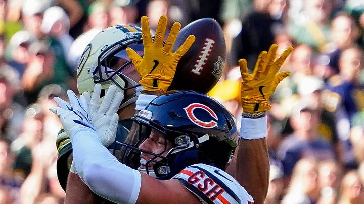 Green Bay Packers wide receiver Christian Watson catches a touchdown pass over Chicago Bears safety Dillon Thieneman. Green Bay Packers wide receiver Christian Watson catches a touchdown pass over Chicago Bears safety Dillon Thieneman.