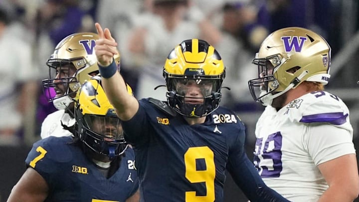 Michigan quarterback J.J. McCarthy points down the field during the second half of the College