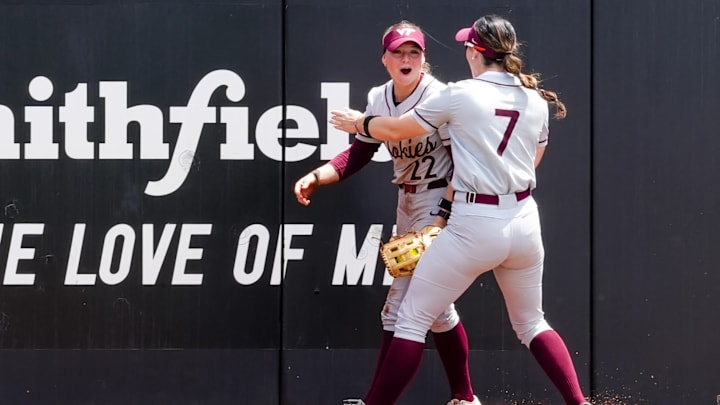 Addison Foster (22) celebrates with Nora Abromavage (7) at Tech Softball Park.