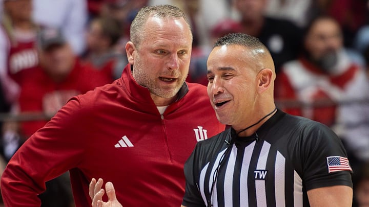 Indiana Head Cozch Darian DeVries talks with an official during the Indiana versus Wisconsin men's basketball game at Simon Skjodt Assembly Hall on Saturday, Feb. 7, 2026.