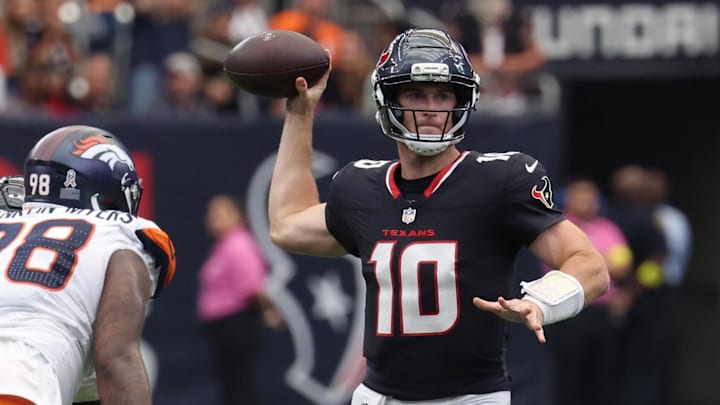 Nov 2, 2025; Houston, Texas, USA; Houston Texans quarterback Davis Mills (10) throws during the first half against the Denver Broncos at NRG Stadium. Mandatory Credit: Thomas Shea-Imagn Images
