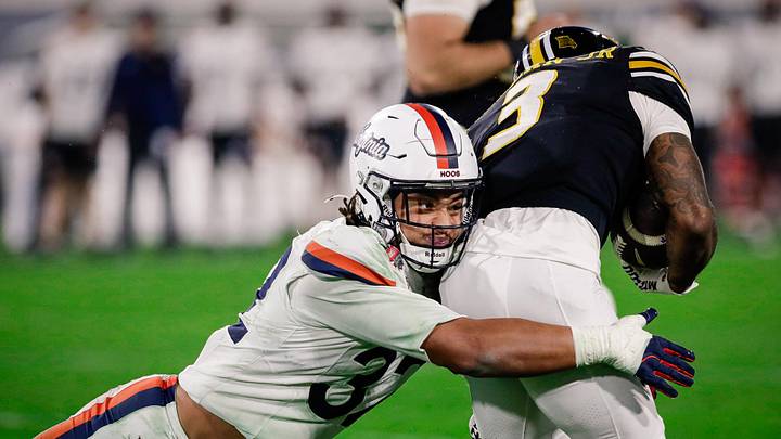 Dec 27, 2025; Jacksonville, FL, USA; Virginia Cavaliers linebacker Landon Danley (32) makes a tackle against the Missouri Tigers during the third quarter at EverBank Stadium. Mandatory Credit: Travis Register-Imagn Images Dec 27, 2025; Jacksonville, FL, USA; Virginia Cavaliers linebacker Landon Danley (32) makes a tackle against the Missouri Tigers during the third quarter at EverBank Stadium. Mandatory Credit: Travis Register-Imagn Images