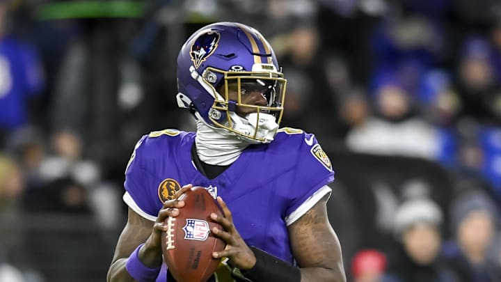 Nov 27, 2025; Baltimore, Maryland, USA;  Baltimore Ravens quarterback Lamar Jackson (8) looks to pass during the game against the Cincinnati Bengals at M&T Bank Stadium. Mandatory Credit: Tommy Gilligan-Imagn Images