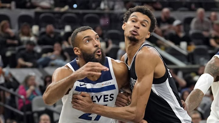 Nov 2, 2024; San Antonio, Texas, USA; San Antonio Spurs center Victor Wembanyama (1) and Minnesota Timberwolves center Rudy Gobert (27) battle for a rebound during the second half at Frost Bank Center. Mandatory Credit: Scott Wachter-Imagn Images Nov 2, 2024; San Antonio, Texas, USA; San Antonio Spurs center Victor Wembanyama (1) and Minnesota Timberwolves center Rudy Gobert (27) battle for a rebound during the second half at Frost Bank Center. Mandatory Credit: Scott Wachter-Imagn Images