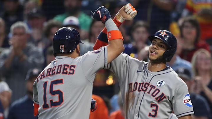 Jun 3, 2025; Pittsburgh, Pennsylvania, USA;  Houston Astros shortstop Jeremy Pena (3) greets third baseman Isaac Paredes (15) crossing home plate on a two run home run against the Pittsburgh Pirates during the ninth inning at PNC Park. Mandatory Credit: Charles LeClaire-Imagn Images