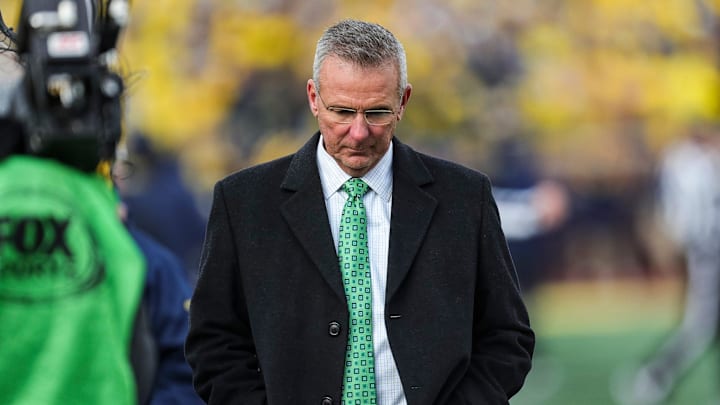 Former Ohio State head coach Urban Meyer walks down the sideline during the second half at Michigan Stadium in Ann Arbor on Saturday, Nov. 25, 2023.