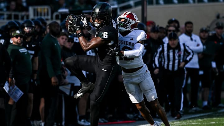 Michigan State's Nick Marsh, left, makes a catch as Indiana's Terry Jones Jr. defends during the first quarter on Saturday, Nov. 2, 2024, at Spartan Stadium in East Lansing.