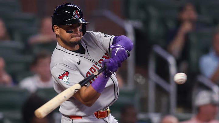 Jun 3, 2025; Atlanta, Georgia, USA; Arizona Diamondbacks catcher Gabriel Moreno (14) hits a single against the Atlanta Braves in the ninth inning at Truist Park. Mandatory Credit: Brett Davis-Imagn Images Jun 3, 2025; Atlanta, Georgia, USA; Arizona Diamondbacks catcher Gabriel Moreno (14) hits a single against the Atlanta Braves in the ninth inning at Truist Park. Mandatory Credit: Brett Davis-Imagn Images