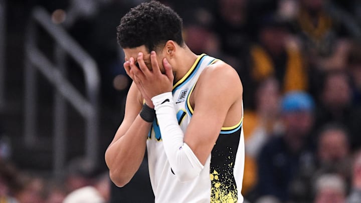 Dec 8, 2024; Indianapolis, Indiana, USA; Indiana Pacers guard Tyrese Haliburton (0) reacts after a play during the second half against the Charlotte Hornets at Gainbridge Fieldhouse. Mandatory Credit: Robert Goddin-Imagn Images 