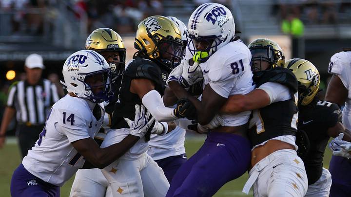Kari Ashley secures a catch amid UCF defenders during TCU’s Big 12 opener in Orlando on Sept. 26, 2026. Photo: KillerFrogs.com.