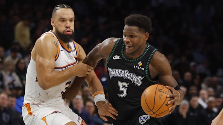 Dec 8, 2025; Minneapolis, Minnesota, USA; Minnesota Timberwolves guard Anthony Edwards (5) works around Phoenix Suns forward Dillon Brooks (3) in the third quarter at Target Center. Mandatory Credit: Bruce Kluckhohn-Imagn Images