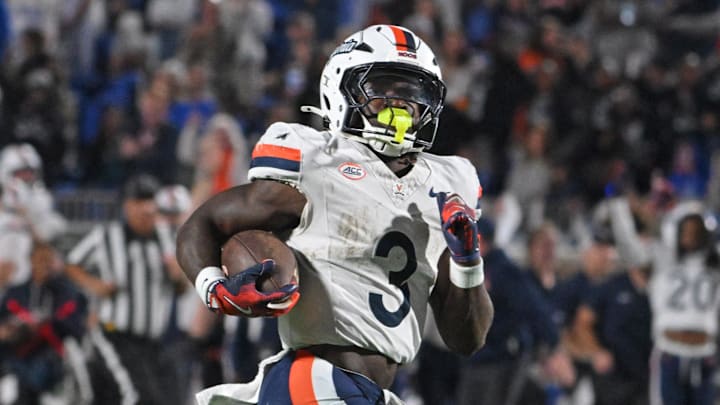Nov 15, 2025; Durham, North Carolina, USA; Virginia Cavaliers running back J'Mari Taylor (3) scores a touchdown against the Duke Blue Devils during the third quarter at Wallace Wade Stadium. Mandatory Credit: Zachary Taft-Imagn Images Nov 15, 2025; Durham, North Carolina, USA; Virginia Cavaliers running back J'Mari Taylor (3) scores a touchdown against the Duke Blue Devils during the third quarter at Wallace Wade Stadium. Mandatory Credit: Zachary Taft-Imagn Images