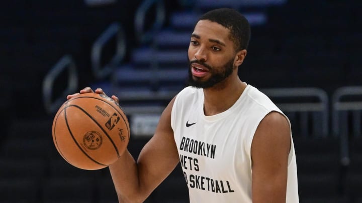 Mar 21, 2024; Milwaukee, Wisconsin, USA; Brooklyn Nets forward Mikal Bridges (1) warms up before game against the Milwaukee Bucks at Fiserv Forum. Mandatory Credit: Benny Sieu-USA TODAY Sports