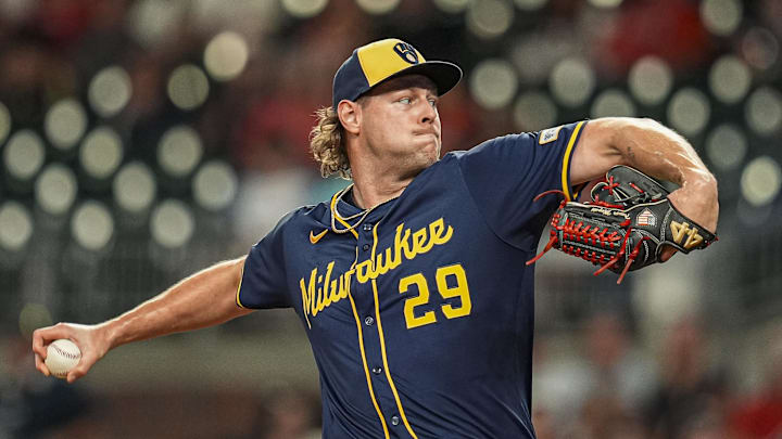 Aug 6, 2025; Cumberland, Georgia, USA; Milwaukee Brewers pitcher Trevor Megill (29) pitches against the Atlanta Braves during the ninth inning at Truist Park. Mandatory Credit: Dale Zanine-Imagn Images