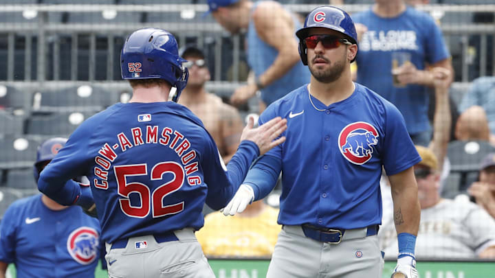 Aug 28, 2024; Pittsburgh, Pennsylvania, USA; Chicago Cubs right fielder Mike Tauchman (40) greets center fielder Pete Crow-Armstrong (52) crossing home plate to score a run against the Pittsburgh Pirates during the ninth inning at PNC Park. Chicago won 14-10.Mandatory Credit: Charles LeClaire-Imagn Images Aug 28, 2024; Pittsburgh, Pennsylvania, USA; Chicago Cubs right fielder Mike Tauchman (40) greets center fielder Pete Crow-Armstrong (52) crossing home plate to score a run against the Pittsburgh Pirates during the ninth inning at PNC Park. Chicago won 14-10.Mandatory Credit: Charles LeClaire-Imagn Images
