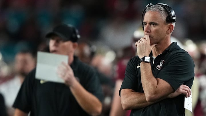 Dec 30, 2023; Miami Gardens, FL, USA; Florida State Seminoles head coach Mike Norvell reacts against