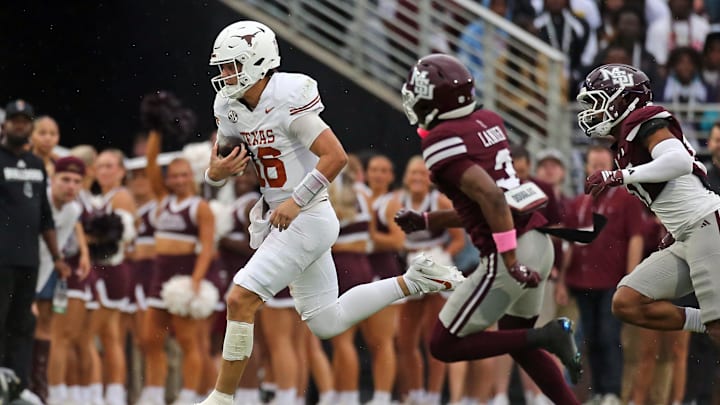 Texas Longhorns quarterback Arch Manning runs the ball during the second quarter against the Mississippi State Bulldogs at Davis Wade Stadium at Scott Field.