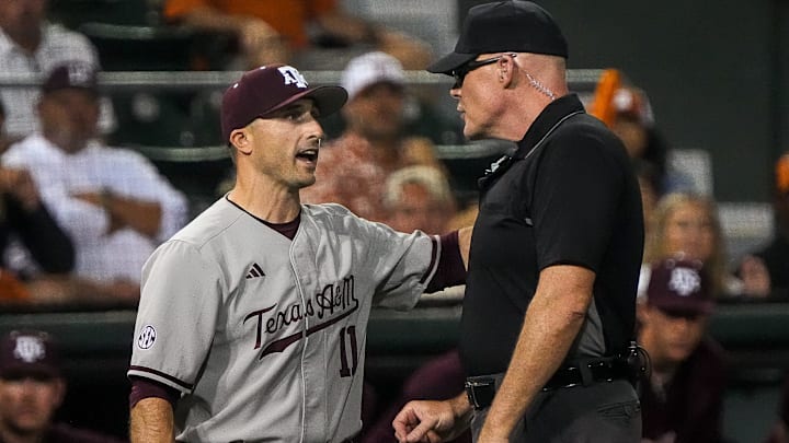 Texas A&M head coach Michael Earley talks to an official during the Lone Star Showdown against Texas at UFCU Disch-Falk Field on Friday, April 25, 2025.