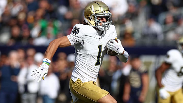 Oct 26, 2024; East Rutherford, New Jersey, USA;  Notre Dame Fighting Irish wide receiver Jaden Greathouse (1) catches the ball during the first half against the Navy Midshipmen at MetLife Stadium. Mandatory Credit: Vincent Carchietta-Imagn Images