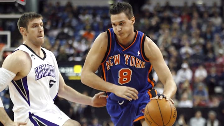 November 25, 2009; Sacramento, CA, USA; New York Knicks forward Danilo Gallinari (8) drives the ball to the hoop against Sacramento Kings forward Andres Nocioni (5) in the first half at Arco Arena. The Kings defeated the Knicks 111-97. Mandatory Credit: Cary Edmondson-Imagn Images