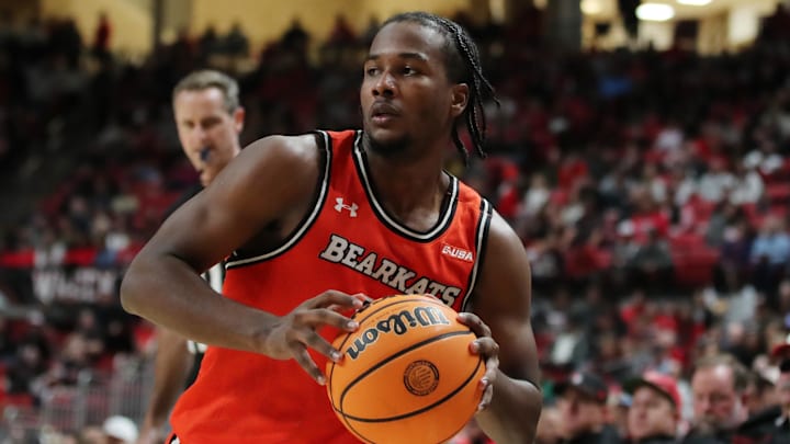 Dec 28, 2023; Lubbock, Texas, USA;  Sam Houston Bearkats guard Davon Barnes (2) works the ball into the paint. 