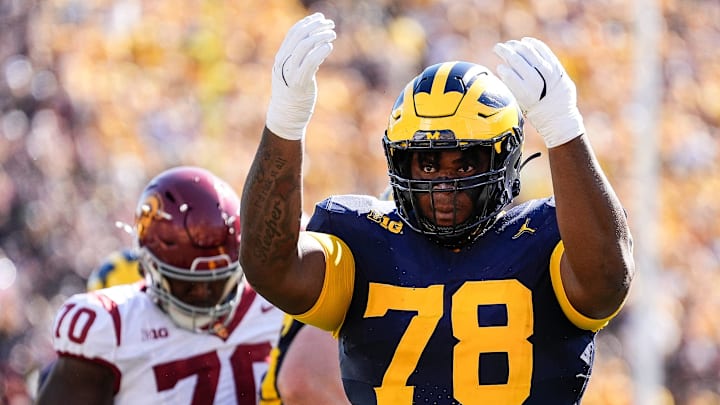 Michigan defensive lineman Kenneth Grant celebrates a tackle against USC. Michigan defensive lineman Kenneth Grant celebrates a tackle against USC.