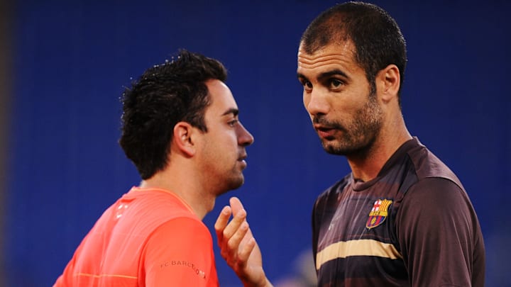 Xavi Hernández y Pep Guardiola