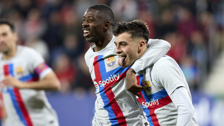 Pedri y Dembélé con el FC Barcelona, celebrando un gol.