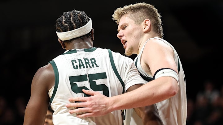 Dec 4, 2024; Minneapolis, Minnesota, USA; Michigan State Spartans forward Jaxon Kohler (0) and forward Coen Carr (55) celebrate during the second half against the Minnesota Golden Gophers at Williams Arena. Mandatory Credit: Matt Krohn-Imagn Images Dec 4, 2024; Minneapolis, Minnesota, USA; Michigan State Spartans forward Jaxon Kohler (0) and forward Coen Carr (55) celebrate during the second half against the Minnesota Golden Gophers at Williams Arena. Mandatory Credit: Matt Krohn-Imagn Images