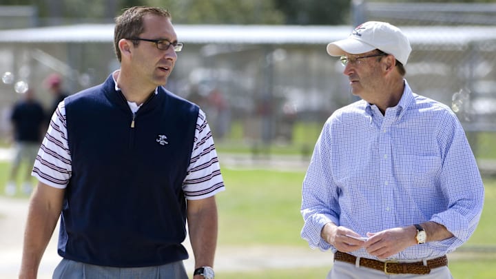 Feb 19, 2011; Jupiter, FL, USA; St. Louis Cardinals General Manager John Mozeliak (L) and Chairman