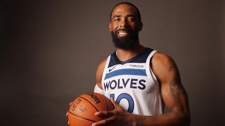 Minnesota Timberwolves guard Mike Conley poses for photos on media day at Target Center in Minneapolis on Sept. 30, 2024.