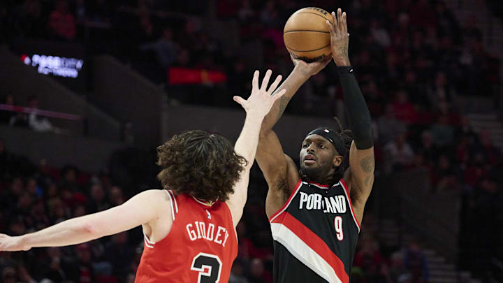 Jan 19, 2025; Portland, Oregon, USA; Portland Trail Blazers forward Jerami Grant (9) shoots a jump shot during the second half against Chicago Bulls guard Josh Giddey (3) at Moda Center. Mandatory Credit: Troy Wayrynen-Imagn Images
