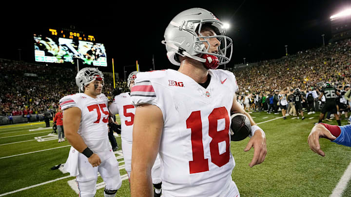 Oct 12, 2024; Eugene, Oregon, USA; Ohio State Buckeyes quarterback Will Howard (18) walks off the field after losing 32-31 to Oregon Ducks during the NCAA football game at Autzen Stadium.