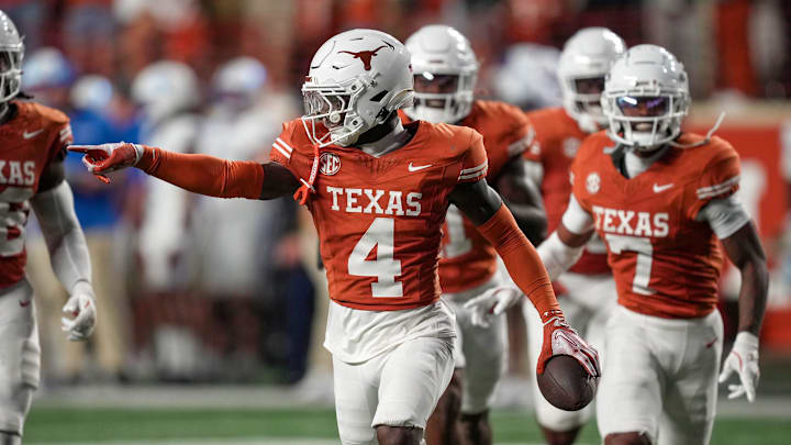 Texas Longhorns defensive back Andrew Mukuba (4) celebrates a interception against the Kentucky Wildcats late in the fourth quarter in a NCAA college football game at Darrell K Royal Texas Memorial Stadium, Austin, Texas, Saturday, Nov 24, 2024.