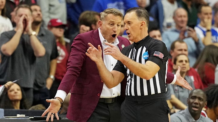 Mar 29, 2025; Newark, NJ, USA; Alabama Crimson Tide head coach Nate Oats talks to a referee during the first half against the Duke Blue Devils in the East Regional final of the 2025 NCAA tournament at Prudential Center. Mandatory Credit: Robert Deutsch-Imagn Images Mar 29, 2025; Newark, NJ, USA; Alabama Crimson Tide head coach Nate Oats talks to a referee during the first half against the Duke Blue Devils in the East Regional final of the 2025 NCAA tournament at Prudential Center. Mandatory Credit: Robert Deutsch-Imagn Images