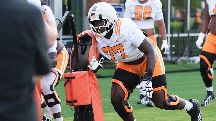 Tennessee offensive lineman Ory Williams (77) participates in a drill during Tennessee football preseason practice in Knoxville, Tennessee, Aug. 11, 2026.