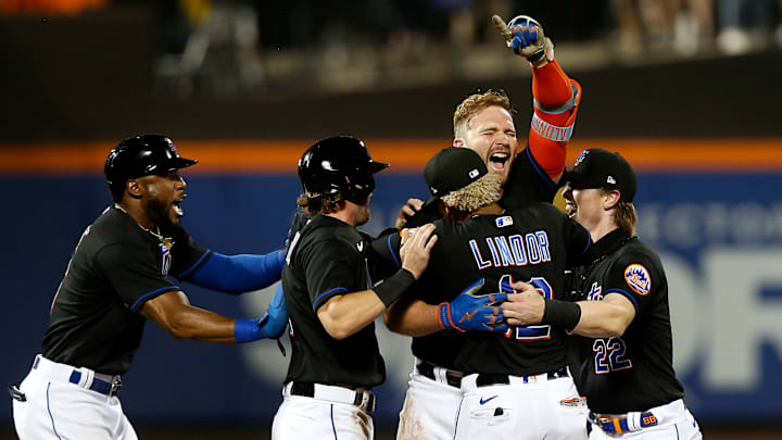 Pete Alonso, Brett Baty, Francisco Lindor, Jeff McNeil and Starling Marte celebrate after a win.