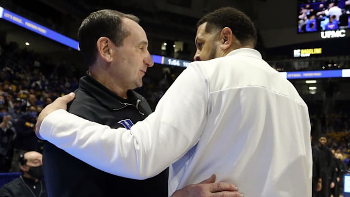 Mar 1, 2022; Pittsburgh, Pennsylvania, USA;  Duke Blue Devils head coach Mike Krzyzewski (left) and Pittsburgh Panthers head coach Jeff Capel (right) greet each other before playing.