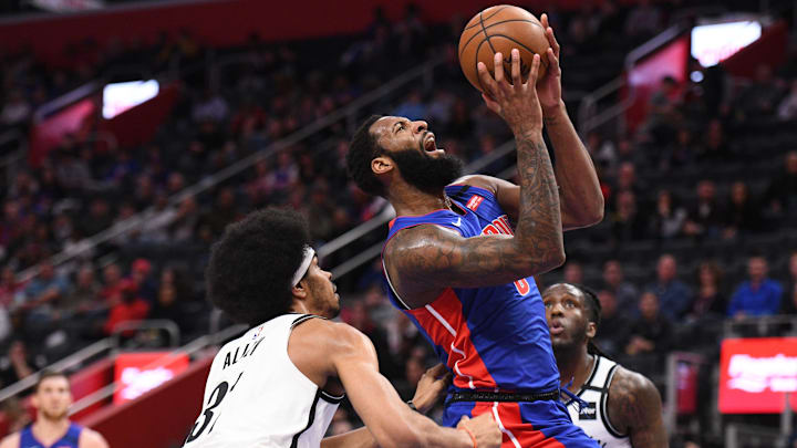 Jan 25, 2020; Detroit, Michigan, USA; Detroit Pistons center Andre Drummond (0) drives to the basket against Brooklyn Nets center Jarrett Allen (31) during the first quarter at Little Caesars Arena. Mandatory Credit: Tim Fuller-Imagn Images