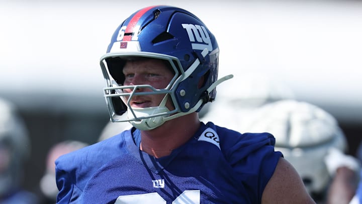 New York Giants center John Michael Schmitz Jr. (61) on the field during training camp at Quest Diagnostics Training Center. New York Giants center John Michael Schmitz Jr. (61) on the field during training camp at Quest Diagnostics Training Center.