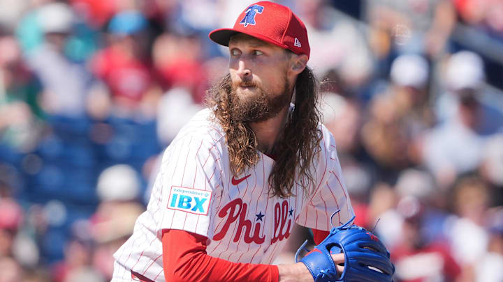 Feb 27, 2025; Clearwater, Florida, USA; Philadelphia Phillies pitcher Matt Strahm (25) throws a pitch against the New York Yankees during the third inning at BayCare Ballpark. 