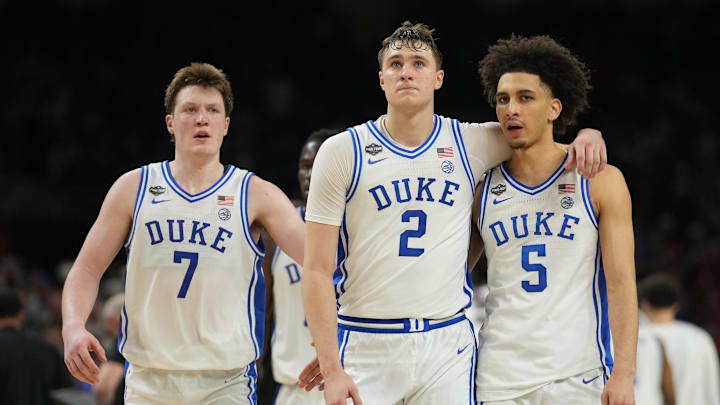 Apr 5, 2025; San Antonio, TX, USA;  Duke Blue Devils forward Cooper Flagg (2) and Duke Blue Devils guard Tyrese Proctor (5) react against the Houston Cougars in the semifinals of the men's Final Four of the 2025 NCAA Tournament at the Alamodome. Mandatory Credit: Robert Deutsch-Imagn Images