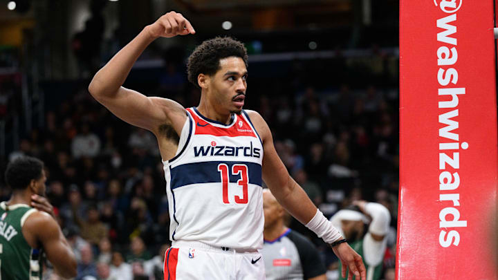 Apr 2, 2024; Washington, District of Columbia, USA; Washington Wizards guard Jordan Poole (13) celebrates after a bucket against Milwaukee.