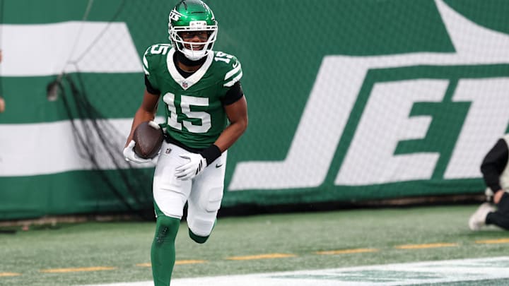 Nov 30, 2025; East Rutherford, New Jersey, USA;New York Jets wide receiver Adonai Mitchell (15) reacts after a touchdown catch against the Atlanta Falcons during the second half at MetLife Stadium. Mandatory Credit: Vincent Carchietta-Imagn Images
