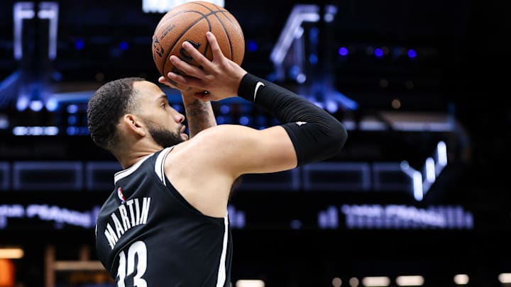 Dec 4, 2025; Brooklyn, New York, USA; Brooklyn Nets guard Tyrese Martin (13) shoots a three pointer against the Utah Jazz during the first quarter at Barclays Center. Mandatory Credit: Tom Horak-Imagn Images Dec 4, 2025; Brooklyn, New York, USA; Brooklyn Nets guard Tyrese Martin (13) shoots a three pointer against the Utah Jazz during the first quarter at Barclays Center. Mandatory Credit: Tom Horak-Imagn Images