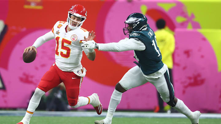 Feb 9, 2025; New Orleans, LA, USA; Kansas City Chiefs quarterback Patrick Mahomes (15) is tackled by Philadelphia Eagles linebacker Josh Sweat (19) in Super Bowl LIX between the Philadelphia Eagles and the Kansas City Chiefs at Ceasars Superdome. Mandatory Credit: Mark J. Rebilas-Imagn Images