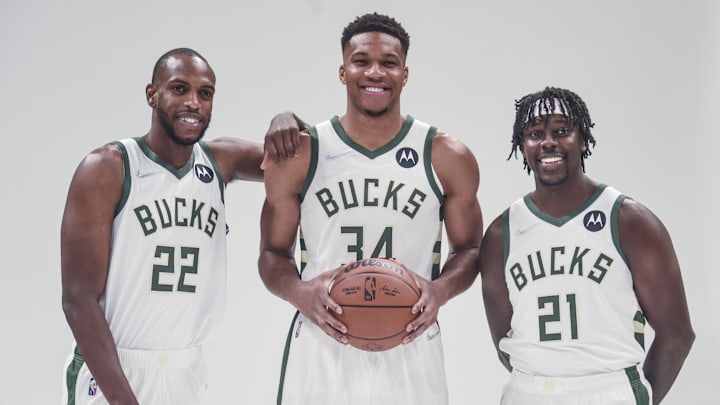 Sep 27, 2021; Milwaukee, WI, USA: Milwaukee Bucks forward Khris Middleton (22) and forward Giannis Antetokounmpo (34) and guard Jrue Holiday (21) pose for pictures during Media Day at the Fiserv Forum. Mandatory Credit: Benny Sieu-Imagn Images Sep 27, 2021; Milwaukee, WI, USA: Milwaukee Bucks forward Khris Middleton (22) and forward Giannis Antetokounmpo (34) and guard Jrue Holiday (21) pose for pictures during Media Day at the Fiserv Forum. Mandatory Credit: Benny Sieu-Imagn Images