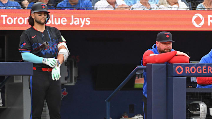 Toronto Blue Jays shortstop Bo Bichette (left) and Manager John Schneider (right)