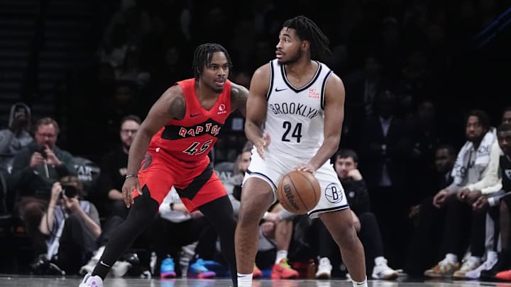 Oct 18, 2024; Brooklyn, New York, USA; Brooklyn Nets small guard Cam Thomas (24) dribbles the ball against Toronto Raptors forward Bruno Fernando (24) during the second half at Barclays Center. Mandatory Credit: Gregory Fisher-Imagn Images Oct 18, 2024; Brooklyn, New York, USA; Brooklyn Nets small guard Cam Thomas (24) dribbles the ball against Toronto Raptors forward Bruno Fernando (24) during the second half at Barclays Center. Mandatory Credit: Gregory Fisher-Imagn Images